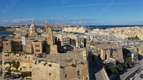 Aerial view of Senglea, Bormla, Valletta old architecture, ancient churches, fortress, cathedrals, bell towers, harbour with sailing boats. Malta. Travel destination. Summer sunny day.
 photo