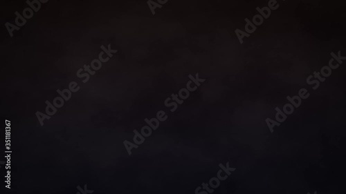 Atmospheric smoke Fog dust effect. VFX Element. Abstract smoke cloud slow motion on black background. White smoke slowly floating through space against black background.
