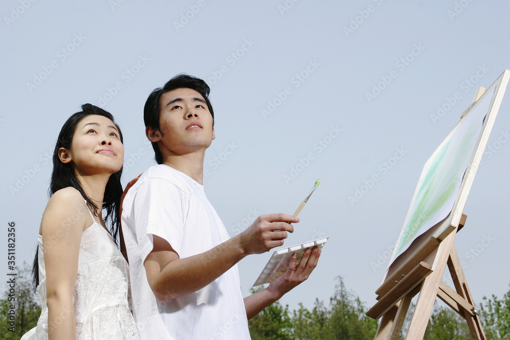 Couple looking up.