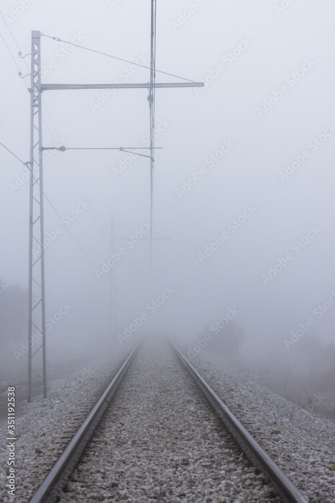 Train tracks with fog