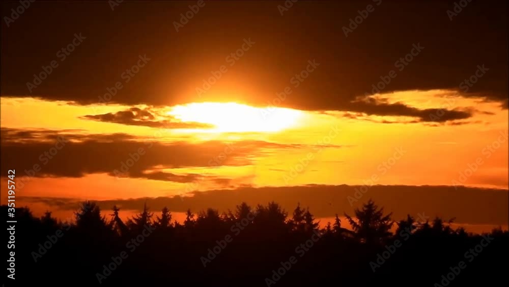 cloudy sunset in the nature, zoom out
