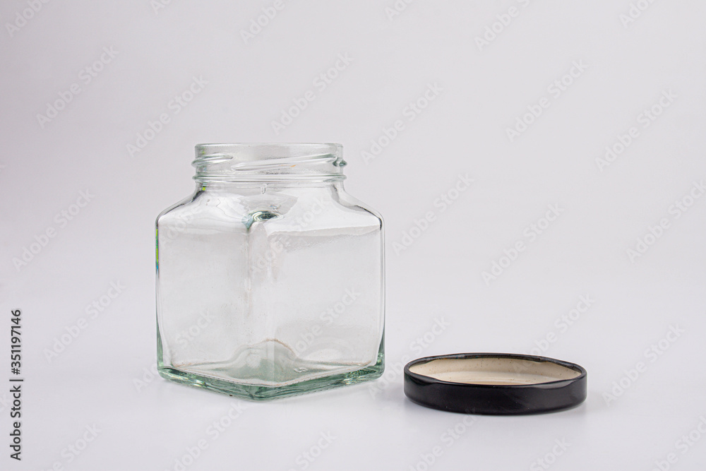 Empty glass jar isolated on white with clipping path Empty glass jar isolated on white with clipping path