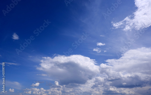 Beautiful and incredible clouds on a bright Sunny day in a blue sky © De n