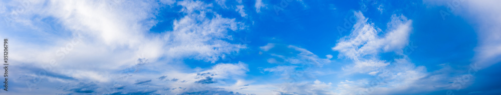 Blue sky panorama with cumulus clouds during summer day Blue sky panorama with cumulus clouds during summer day