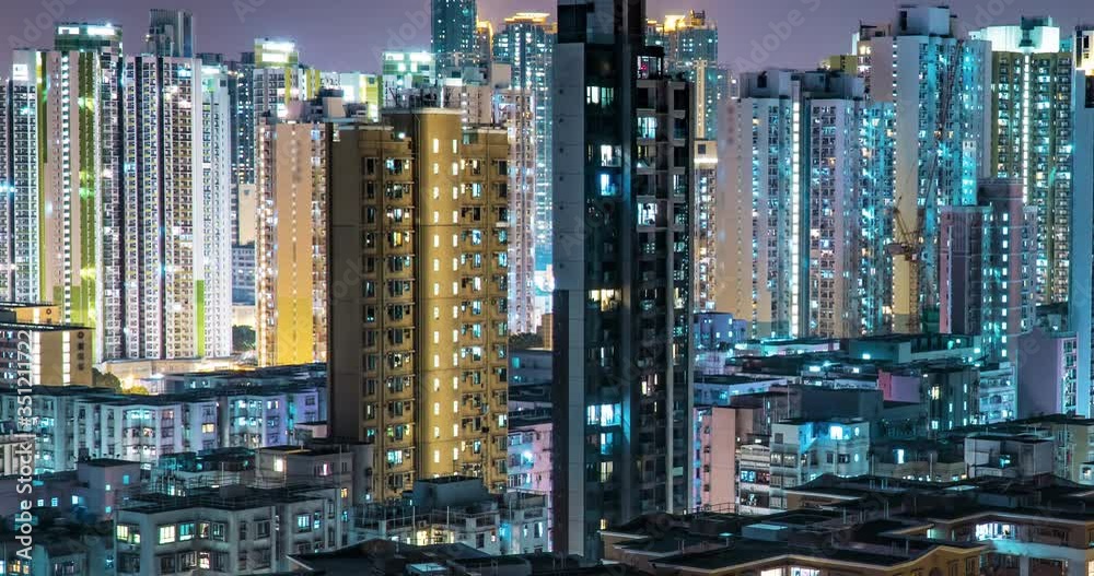 Urban Cityscape Real Estate Residential Building At Night Old Buildings and Modern Skyscrapers on the Background. Night-Scape Time Lapse in Metropolis. City Time Lapse Urban Cityscape Real Estate Residential Building At Night Old Buildings and Modern Skyscrapers on the Background. Night-Scape Time Lapse in Metropolis. City Time Lapse