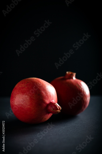Pomegranate on dark background