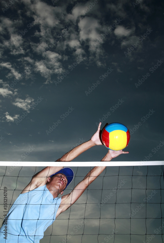 Man trying to block a ball