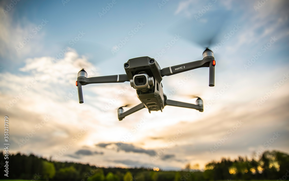 Graz, Austria 0105.2020 - DJI Drone Mavic 2 Pro with Hasselblad camera  flying against blue sky. Copy space Stock Photo | Adobe Stock