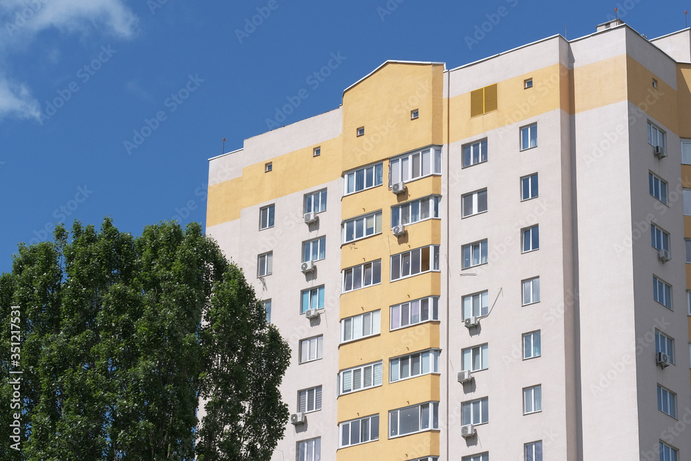 Facade of a modern high-rise house Facade of a modern high-rise house
