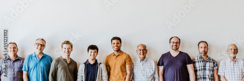 Cheerful diverse men standing in a line background