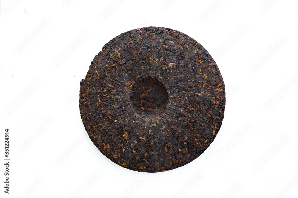 Puer tea in the form of tortillas on a white background, different varieties.