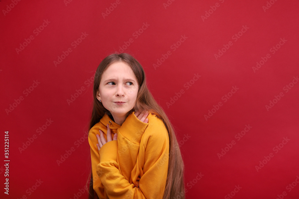 The girl with a cunning face turns around and looks back. The girl with a cunning face turns around and looks back.