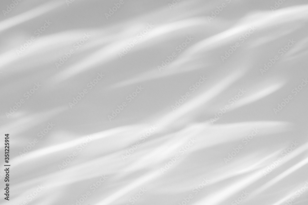 Geometric texture overlay effect for photo and mockups. Organic drop diagonal shadow and light caustic effect on a white wall. Geometric texture overlay effect for photo and mockups. Organic drop diagonal shadow and light caustic effect on a white wall.