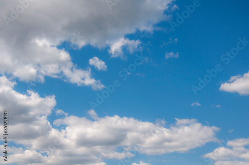 White clouds on a blue sky. Beautiful natural background.