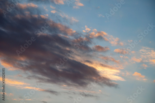 Beautiful sky with clouds at sunset. Beautiful natural background © Tetiana