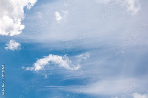 White clouds on a blue sky. Beautiful natural background