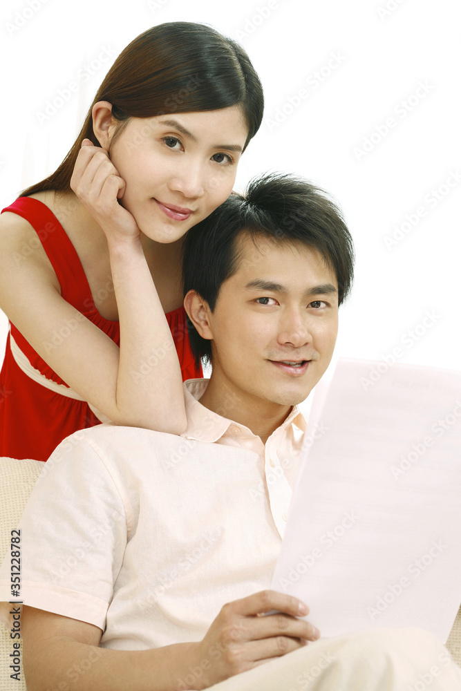 Man and woman smiling at the camera Man and woman smiling at the camera