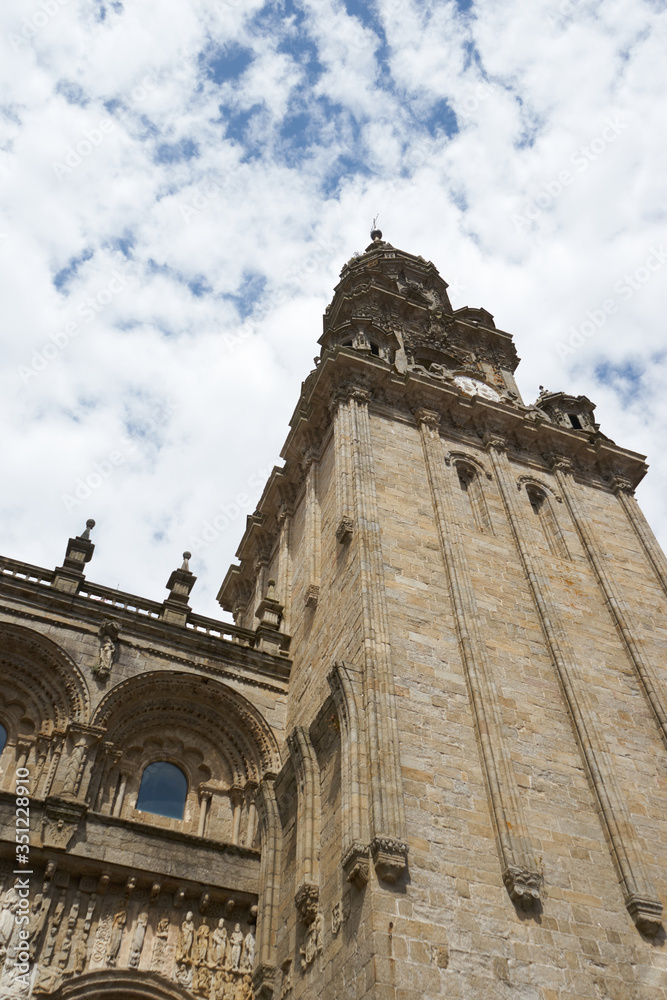 Clock tower from the cathedral in Santiago de Compostela under a cloudy sky