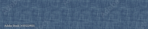 
Seamless indigo blue woven linen texture pattern. Denim worn out weave style background. Decorative irregular acid wash japanese boro all over print. Fabric grunge canvas textile effect cloth swatch.