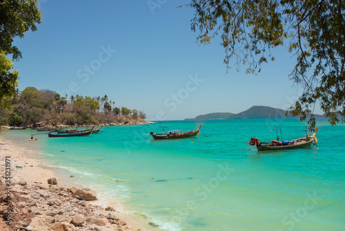 exotic islands. Boats stand in azure water near the shore. Phuket, Thailand
