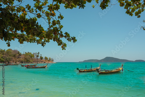 exotic islands. Boats stand in azure water near the shore. Phuket, Thailand