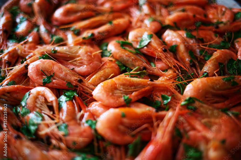 Fresh boiled prawns with coriander. A delicious dish of seafood. Fresh boiled prawns with coriander. A delicious dish of seafood.