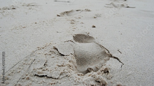 Footprints on a sand. Beach holiday