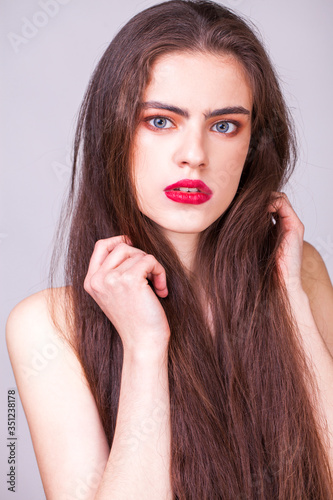 Make up beauty female face. Close up portrait of a young beautiful brunette woman