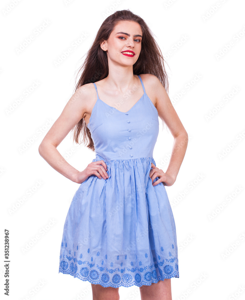 Fashion portrait of a young beautiful woman in dress