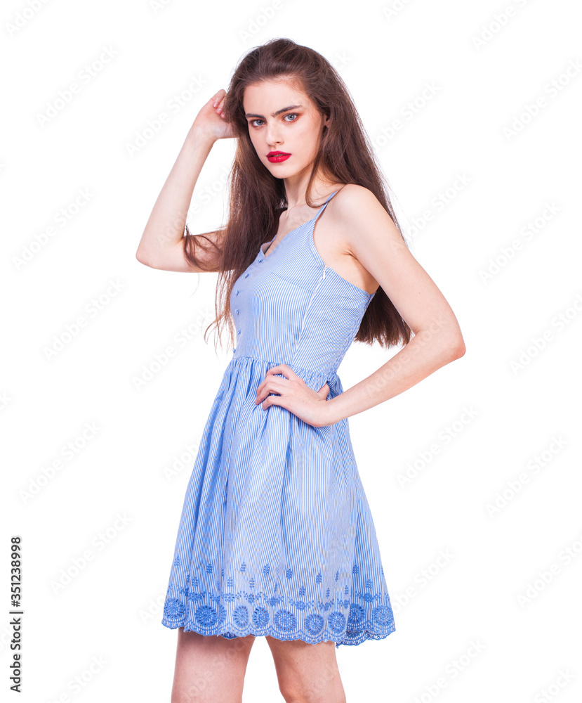 Fashion portrait of a young beautiful woman in dress Fashion portrait of a young beautiful woman in dress