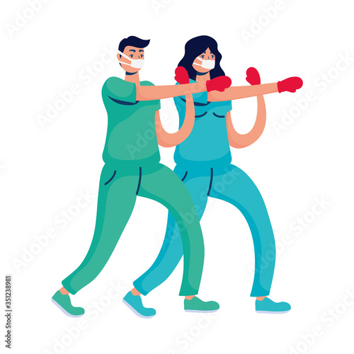 professional doctors couple boxing with gloves