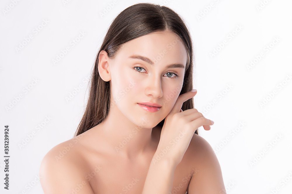 Beautiful Young Woman touching her clean face with fresh Healthy Skin, isolated on white background, Beauty Cosmetics and Facial treatment Concept.