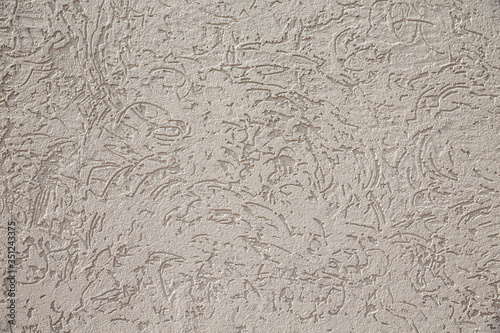 Foto gray perforated cement wall loose