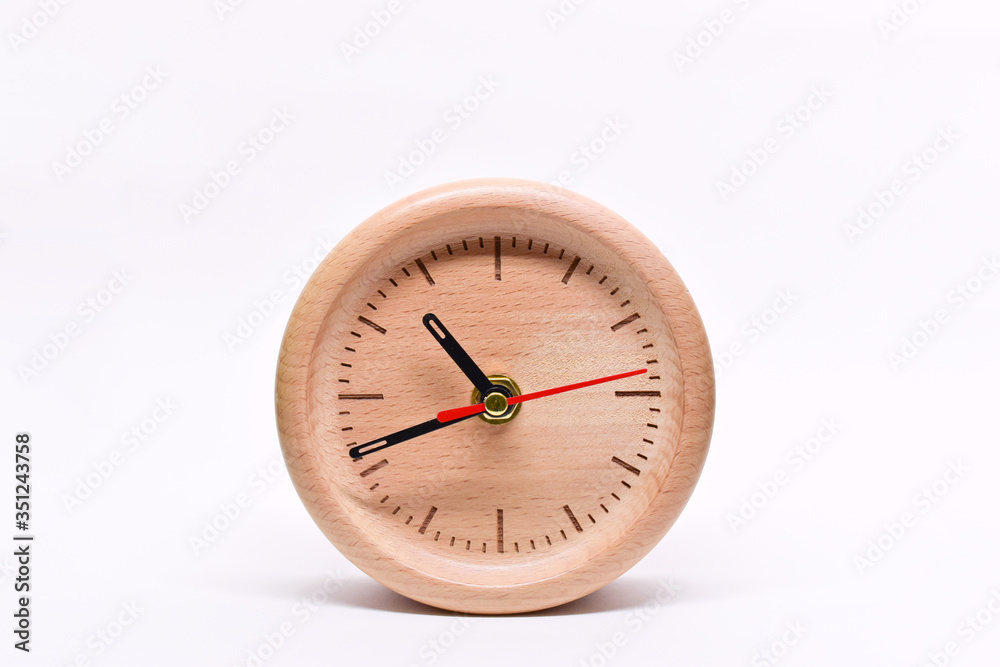 wooden table clock of time, single object isolated on white background wooden table clock of time, single object isolated on white background