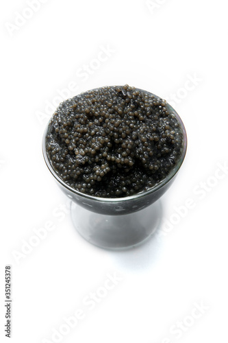 black caviar in a glass vase