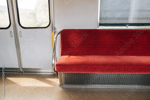 Obraz na płótnie Interior of subway. Inside Japanese metro train. Empty seats and door w salonie