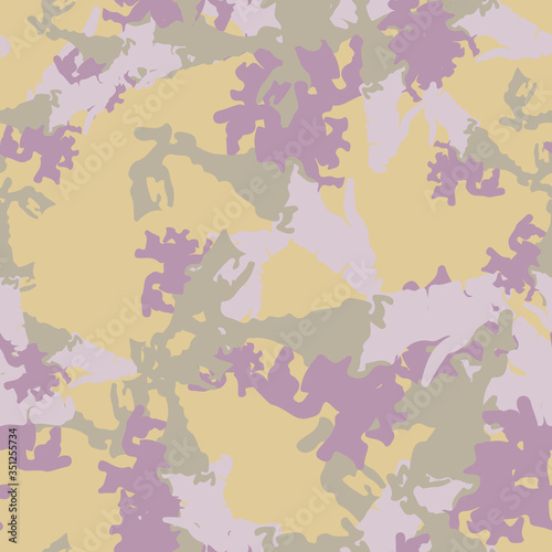 Field camouflage of various shades of beige, green and violet colors