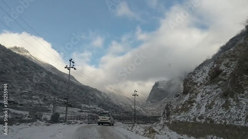 Road to Lachen in snowfall, Silk Route, Sikkim, India. photo