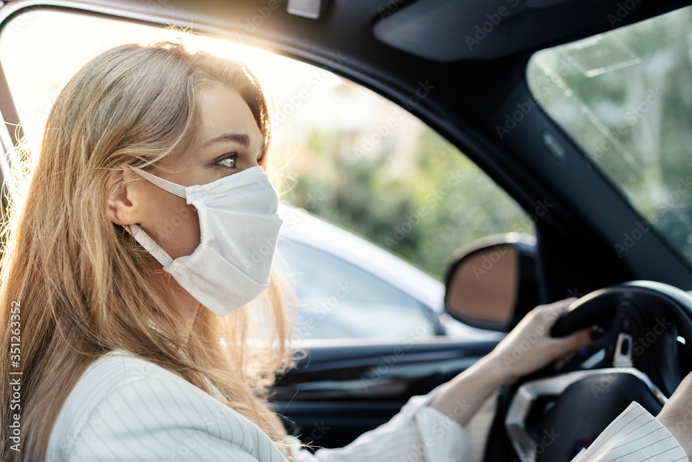 Business woman is using car transportation while working on phone Business woman is using car transportation while working on phone