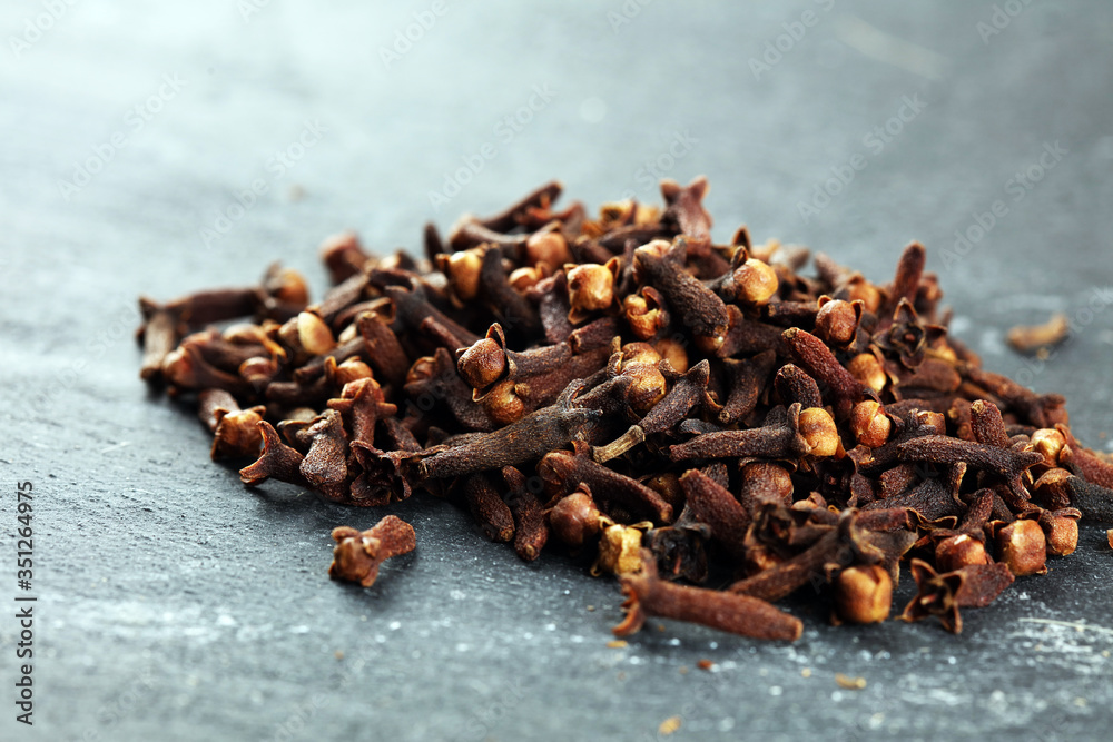 freshly dryed cloves spice texture on background freshly dryed cloves spice texture on background