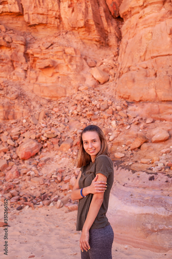 Beautiful girl on a background of nature of Egypt. Portrait photo of a girl traveler. In the background is the desert. Photo for tour agency
Beautiful girl on a background of nature of Egypt. Portrait photo of a girl traveler. In the background is the desert. Photo for tour agency