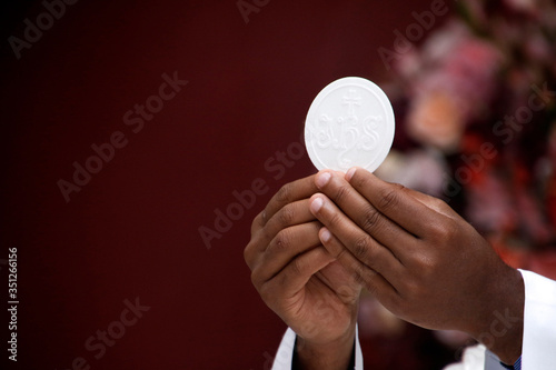 Consecration of bread and wafer wine