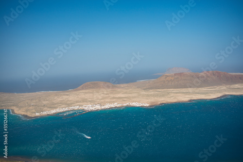 Aerial view on the coastline of Lanzarote island on a sunny day 