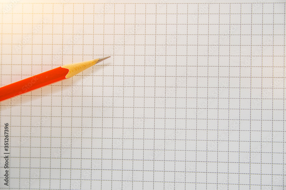 Pencil red on the grid frame paper background project work Pencil red on the grid frame paper background project work