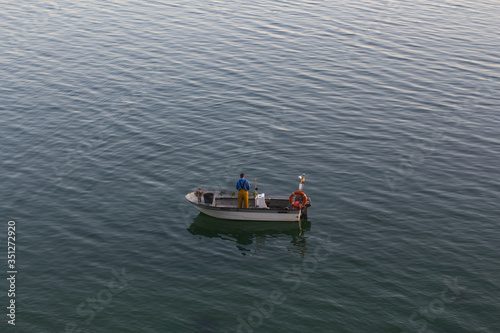 Fisherman on a small boat