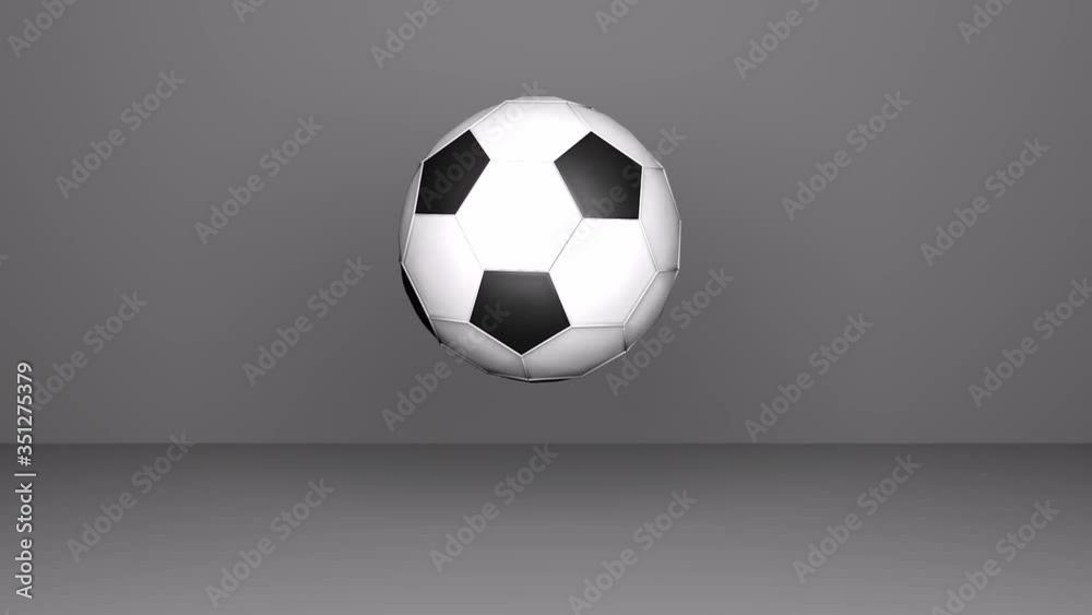 Soccer ball rotates in the air on a gray background. 3D animation Soccer ball rotates in the air on a gray background. 3D animation