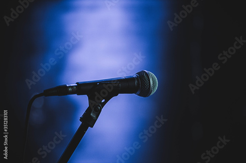 microphone on stage with spotlight