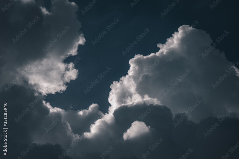 Large white cumulus clouds against a blue sky Large white cumulus clouds against a blue sky