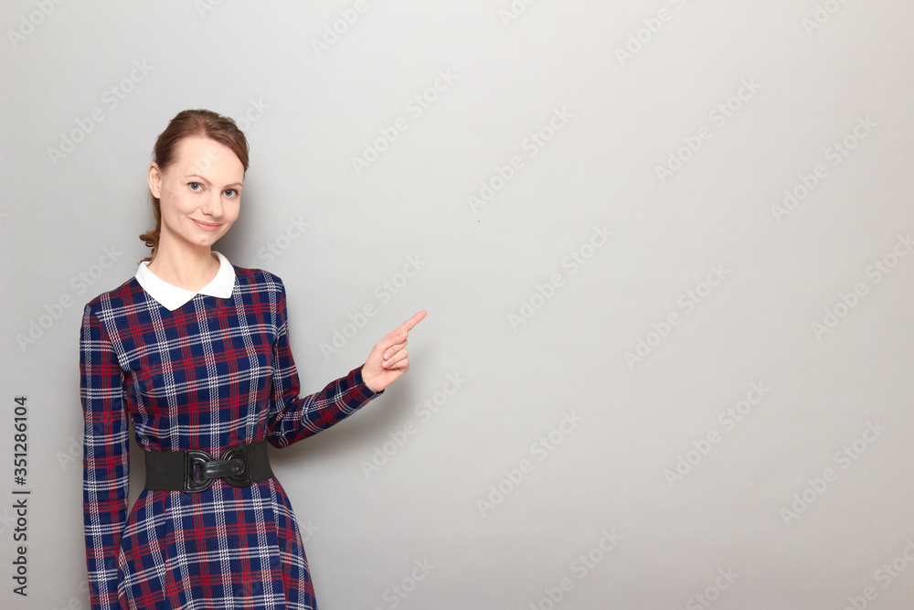 Portrait of happy girl pointing with index finger at copy space Portrait of happy girl pointing with index finger at copy space