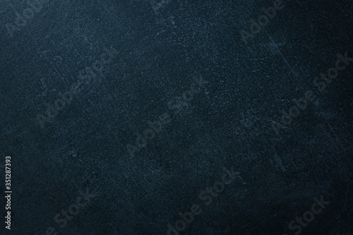 Dark concrete wall, abstract texture background